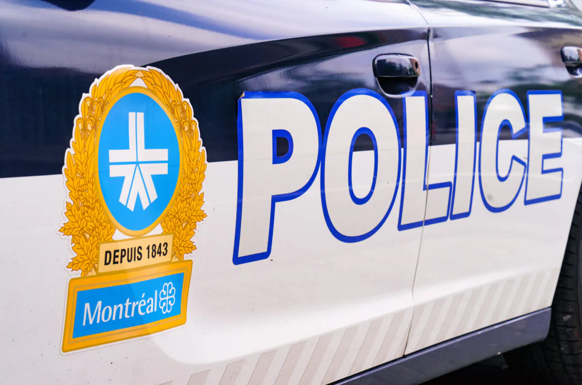 The Montreal Police logo is seen on a police car in Montreal on July 8, 2020. (The Canadian Press/Paul Chiasson)