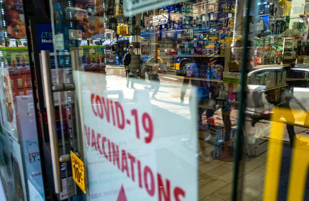 A pharmacy advertises COVID-19 vaccines in a window in the Queens borough of New York City, on May 11, 2023. (Spencer Platt/Getty Images)