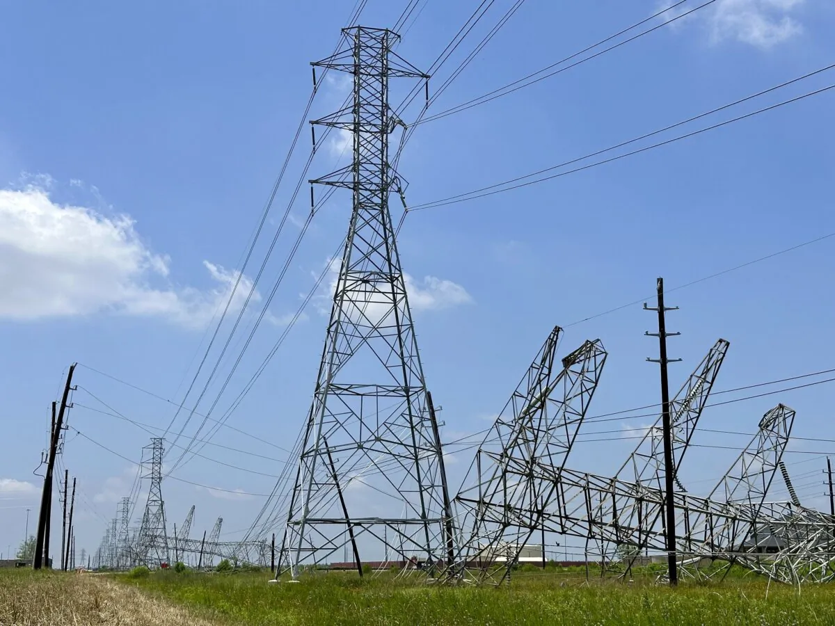 Power transmission lines were twisted and toppled after powerful storms swept through the Houston area in Cypress, Texas, on May 18, 2024. (Mark Vancleave/AP photo)