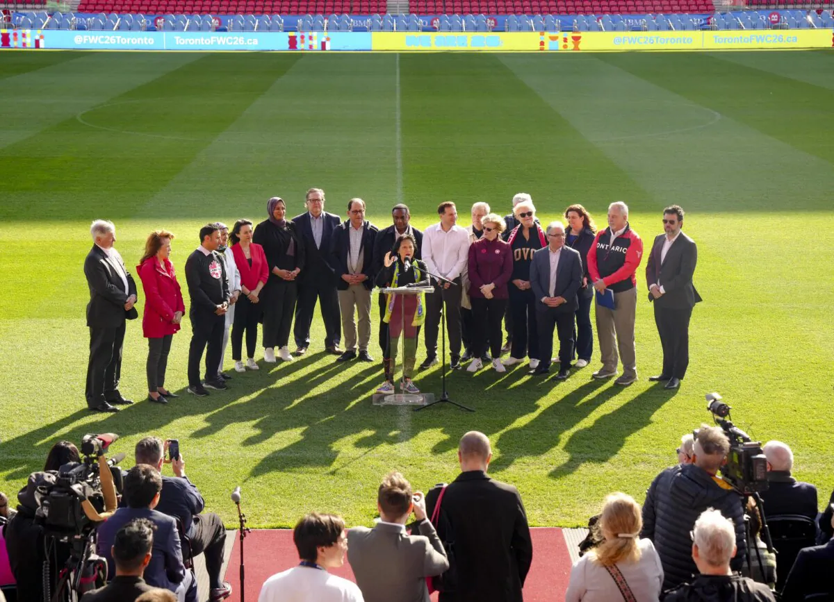 Toronto Mayor Olivia Chow (C) makes an announcement about the 2026 FIFA World Cup at BMO Field in Toronto on May 3, 2024. (The Canadian Press/Chris Young)
