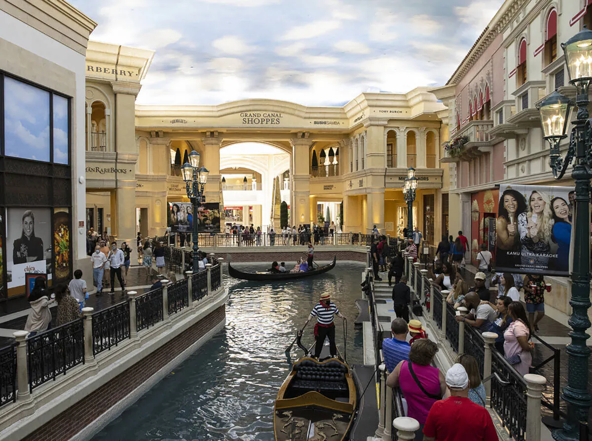 Tourists take a gondola ride in the Grand Canal at the Venetian hotel-casino, on June 1, 2021, in Las Vegas. (Bizuayehu Tesfaye/Las Vegas Review-Journal/TNS)
