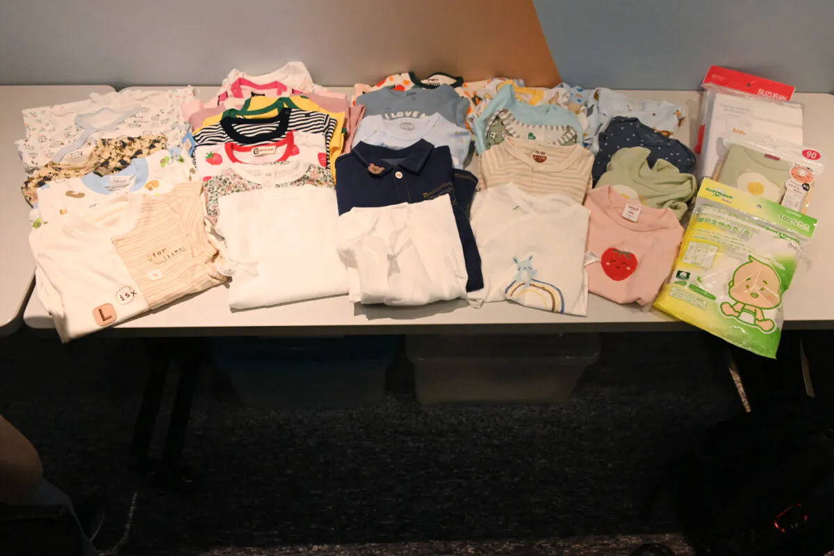 At a press conference on May 16, 2024, the Hong Kong Consumer Council said it tested 30 popular brands of infant clothing and found many of them to have various kinds of safety risks. (Bill Cox/The Epoch Times)