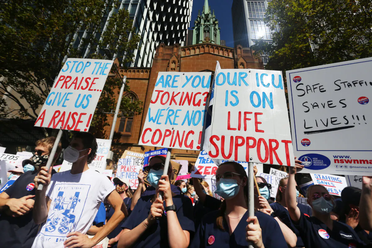 Nurses and members of the health sector rally outside NSW Parliament House in Sydney, Australia,  on Feb. 15, 2022. (Lisa Maree Williams/Getty Images)