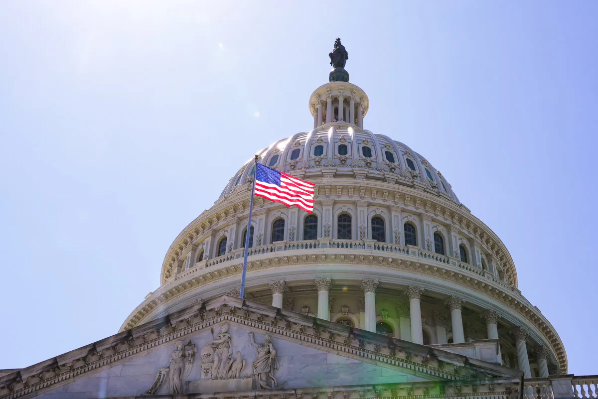A United States flag flies at the U.S. Capitol in Washington on May 13, 2024. (Lei Chen/NTD)