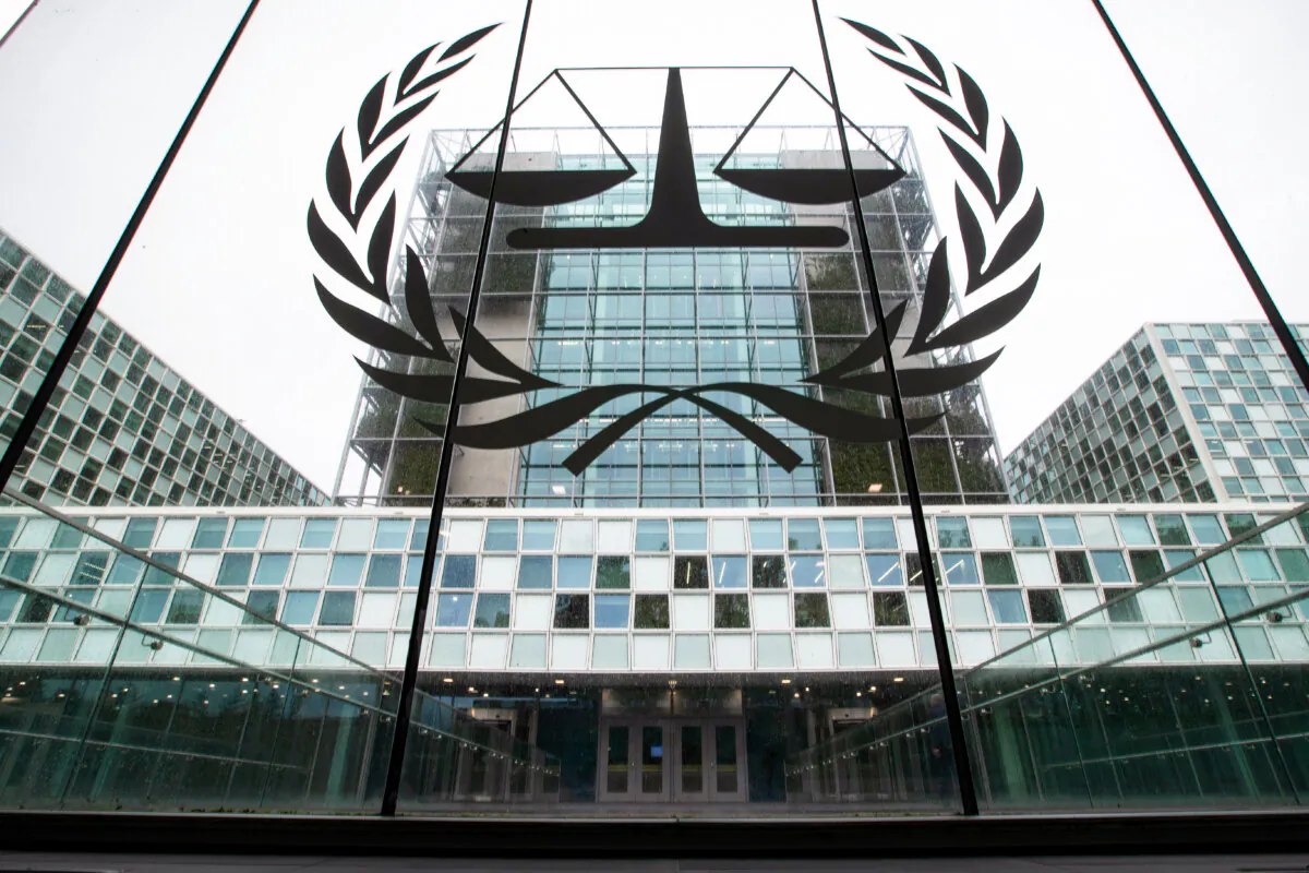 -FILE- In this Thursday, Nov. 7, 2019 file image the International Criminal Court, or ICC, is seen in The Hague, Netherlands. Sudanese militia leader Ali Kushayb has been arrested on war crimes charges related to the conflict in Darfur more than 13 years after a warrant was issued for him, authorities said Tuesday. Kushayb surrended to authorities in a remote corner of northern Central African Republic, near the country's border with Sudan, International Criminal Court spokesman Fadi El Abdallah said. (AP Photo/Peter Dejong, File)