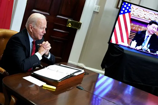 President Joe Biden meets with Chinese leader Xi Jinping during a virtual summit from the White House in Washington on Nov. 15, 2021. (Mandel Ngan/AFP)