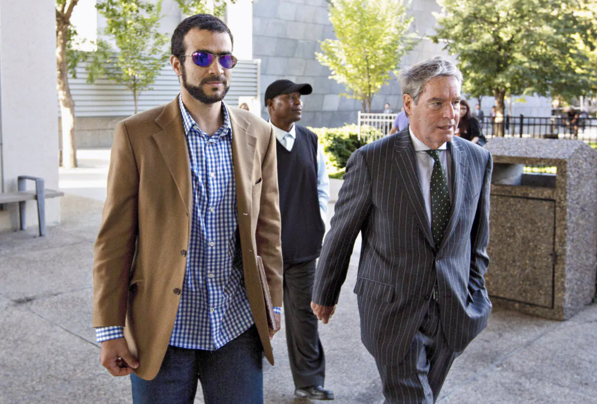 Omar Khadr and his lawyer Dennis Edney arrive at Mr. Khadr's bail conditions hearing in Edmonton, Alta., on Sept. 11, 2015. (Jason Franson/The Canadian Press)