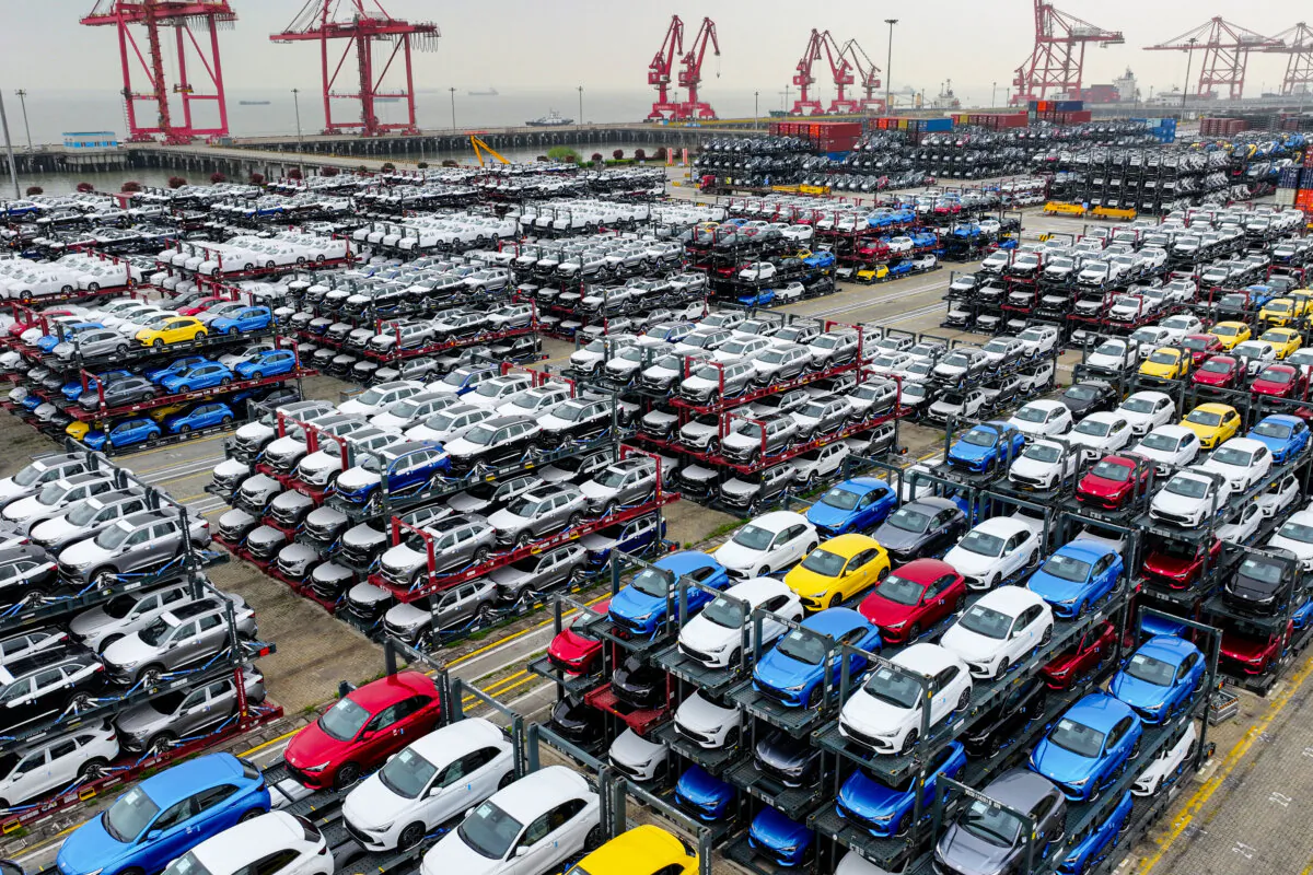 This aerial photograph shows electric cars for export stacked at the international container terminal of Taicang Port in Suzhou, in China's eastern Jiangsu Province, on April 16, 2024. (STR/AFP via Getty Images)