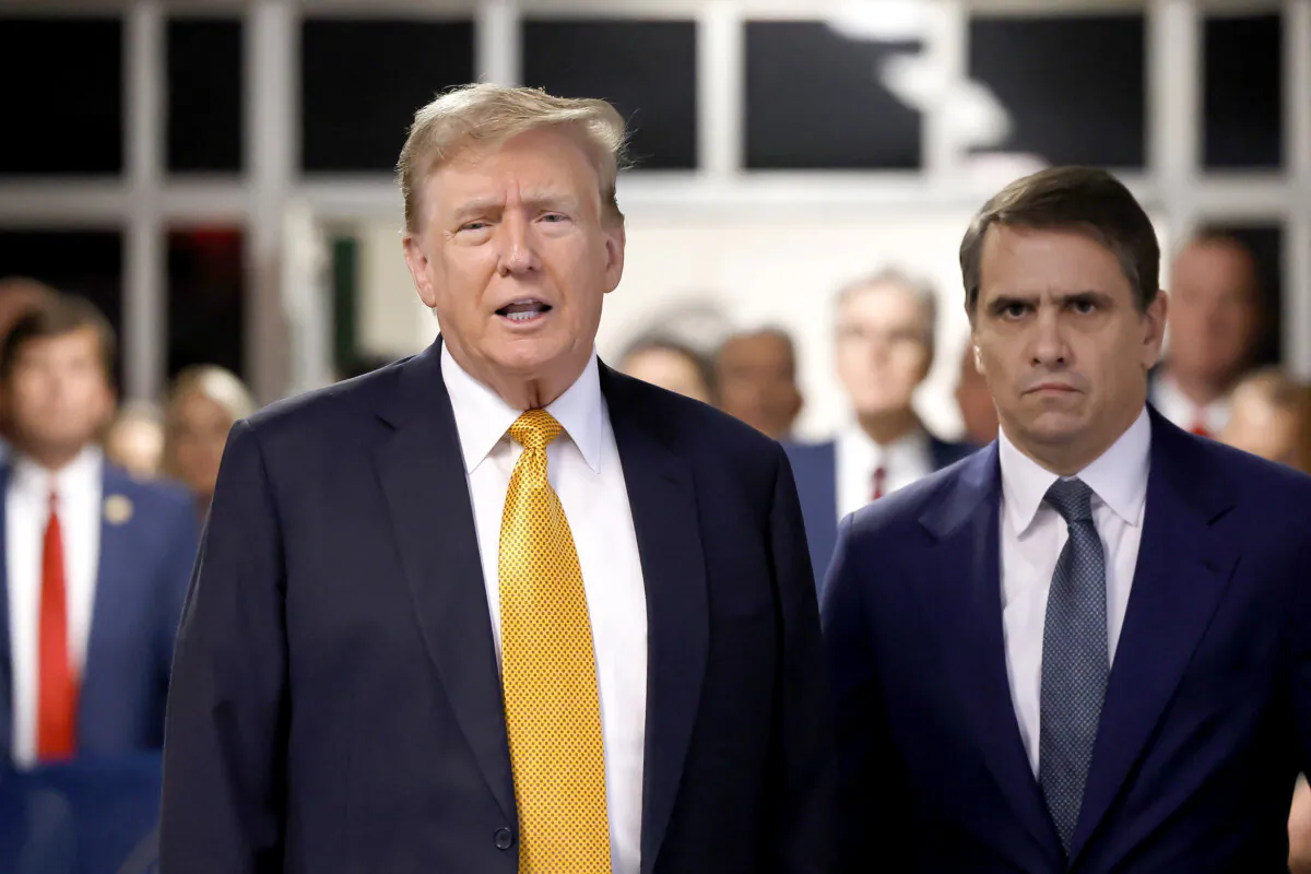 Former President and Republican presidential candidate Donald Trump next to his lawyer Todd Blanche (R), speaks to the press during his criminal trial at Manhattan Criminal Court in New York City on May 21, 2024. (Michael M. Santiago/Pool/AFP via Getty Images)