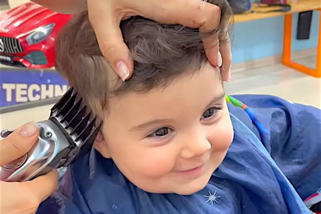 Adorable Baby Can't Stop Smiling During Haircut