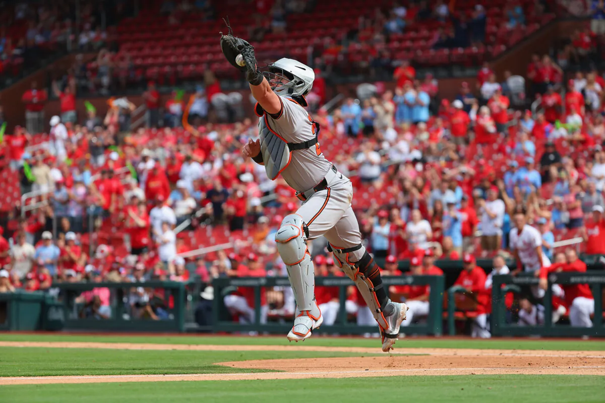 James McCann #27 of the Baltimore Orioles fields a throw home against the St. Louis Cardinals in the sixth inning at Busch Stadium in St. Louis, Mo., on May 22, 2024. (Dilip Vishwanat/Getty Images)
