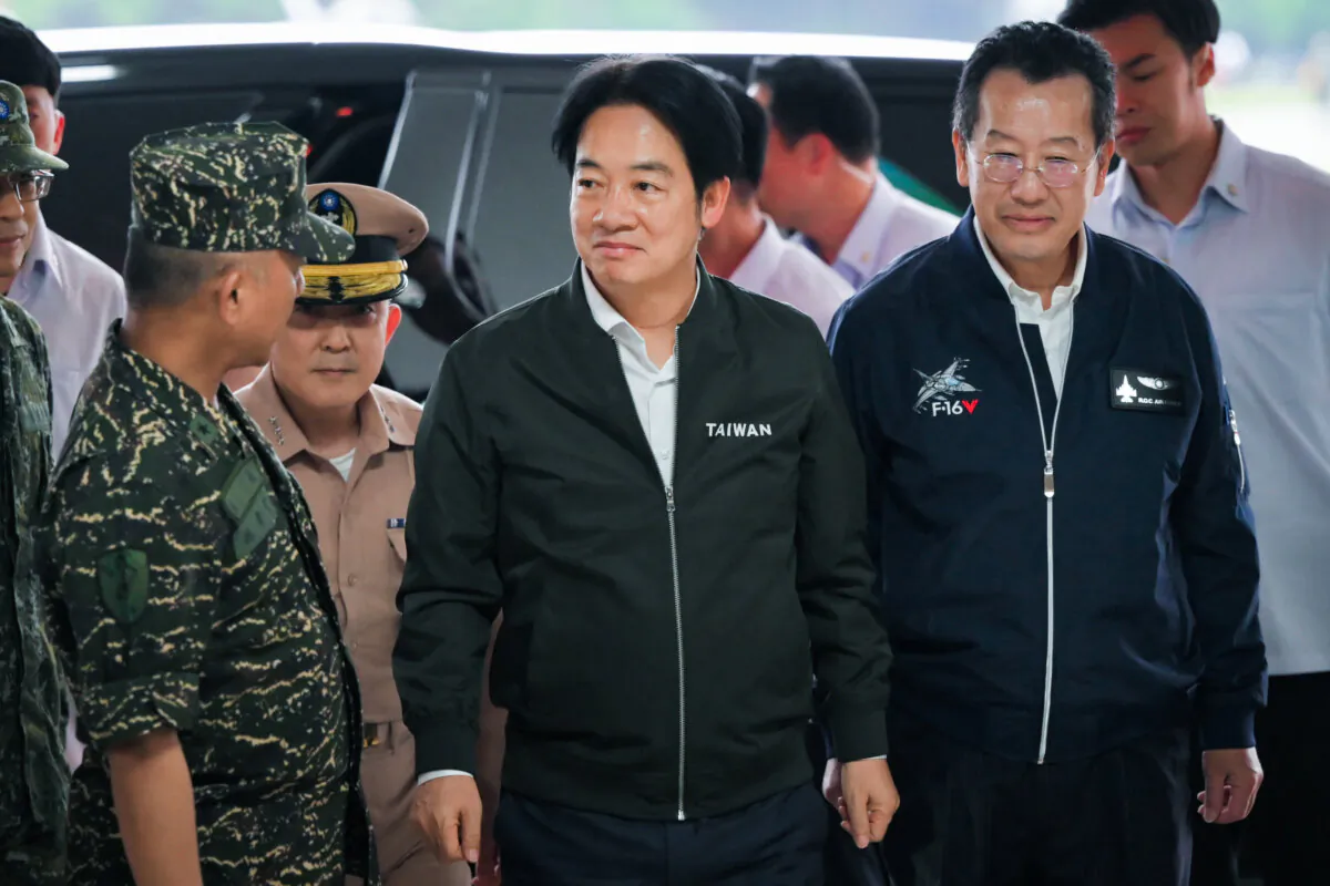 Taiwan President Lai Ching-te (C) and Defence Minister Wellington Koo arrive on a visit to inspect military troops in Taoyuan on May 23, 2024. (Sam Yeh/AFP via Getty Images)