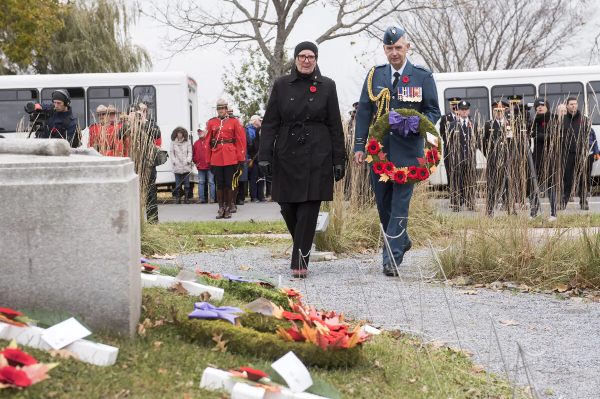 New Brunswick Lt.-Gov. Brenda Murphy places a wreath at the cenotaph as part of the provincial Remembrance Day ceremony in Fredericton, on Nov. 11, 2023. (The Canadian Press/Stephen MacGillivray)