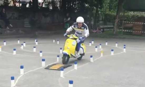 Man Competes in Scooter Competition