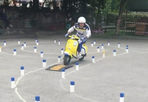 Man Competes in Scooter Competition