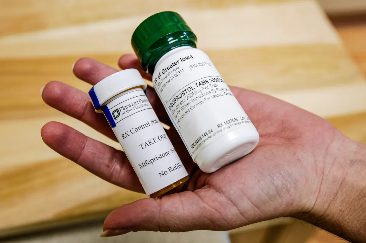 Bottles of abortion pills mifepristone (L) and misoprostol seen at a clinic in Des Moines, Iowa, on Sept. 22, 2010. (Charlie Neibergall/AP Photo)