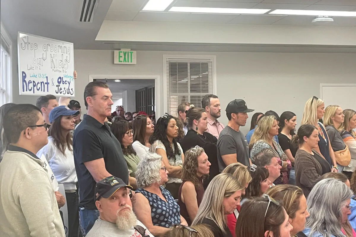 Parents and community members at the Encinitas Union School District board meeting, inside and outside the boardroom, on May 21, 2024. (Sophia Fang/The Epoch Times)
