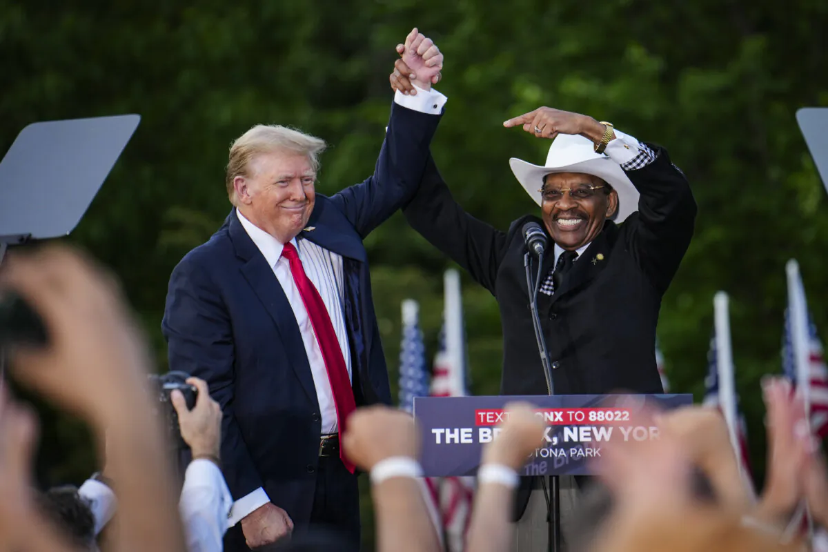 Former President Donald Trump and The Rev Ruben Diaz Sr. at a rally in the South Bronx in New York City on May 23, 2024. (Samira Bouaou/The Epoch Times)