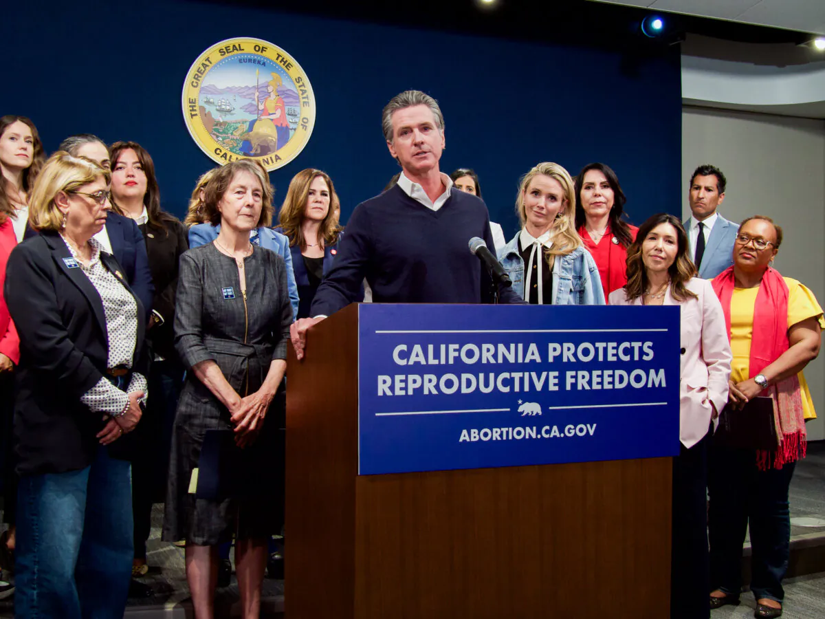 California Gov. Gavin Newsom speaks support of Senate Bill 233, which would allow Arizona doctors to perform abortions in California, during a press conference at the Capitol in Sacramento, Calif., on April 24, 2024. (Travis Gillmore/The Epoch Times)