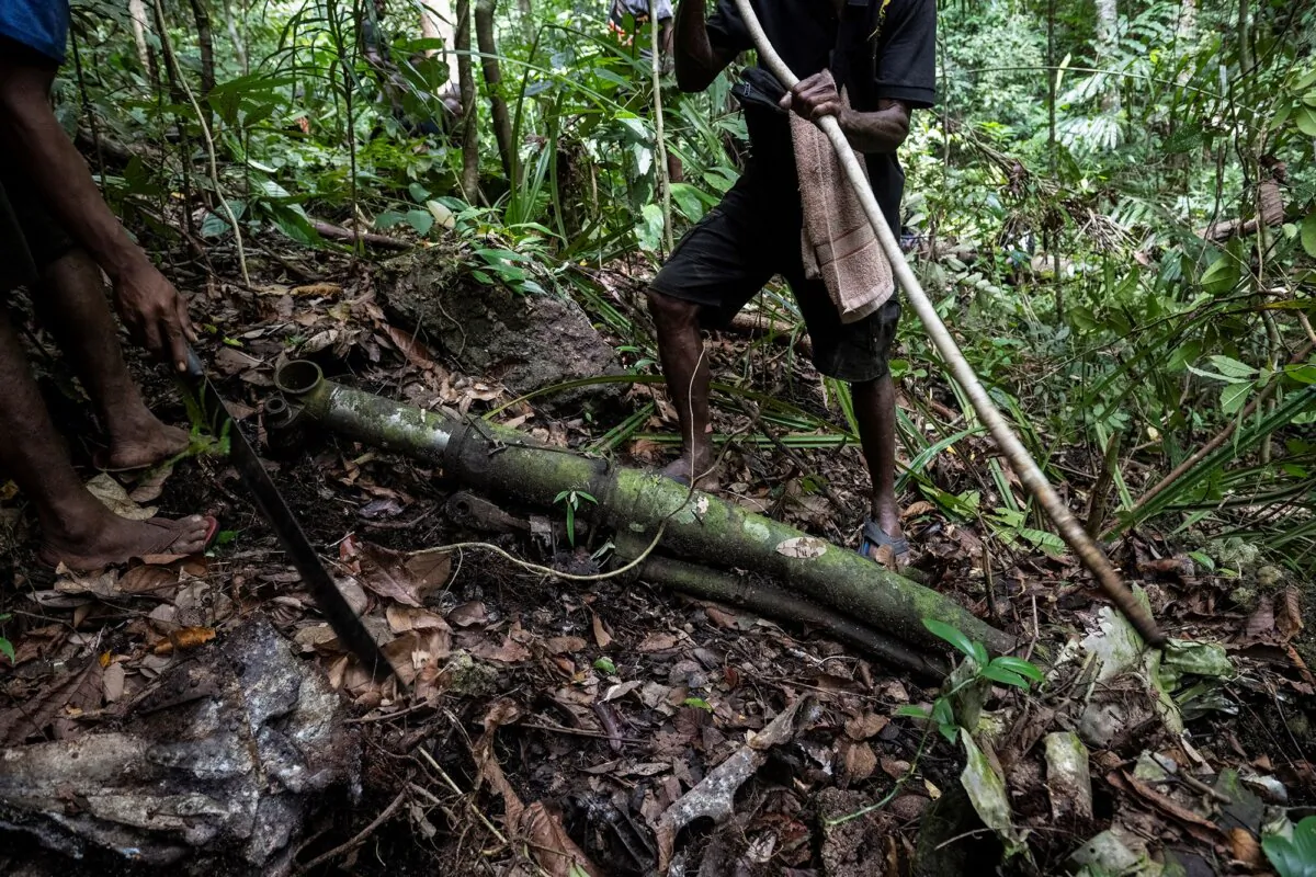 A piece of wreckage from World War II ace Richard Bong's P-38 Lightning fighter plane as it lays on the ground in the jungles of Madang Province, Papua New Guinea, on May 15, 2024. (Pacific Wrecks/Joel Carillet via AP)