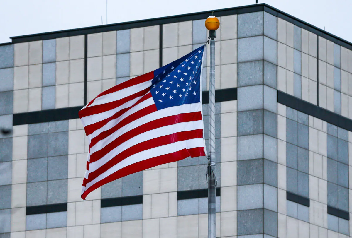 An American flag flutters in the wind at the U.S. embassy in Kyiv, Ukraine, on January 24, 2022. (Gleb Garanich/Reuters)