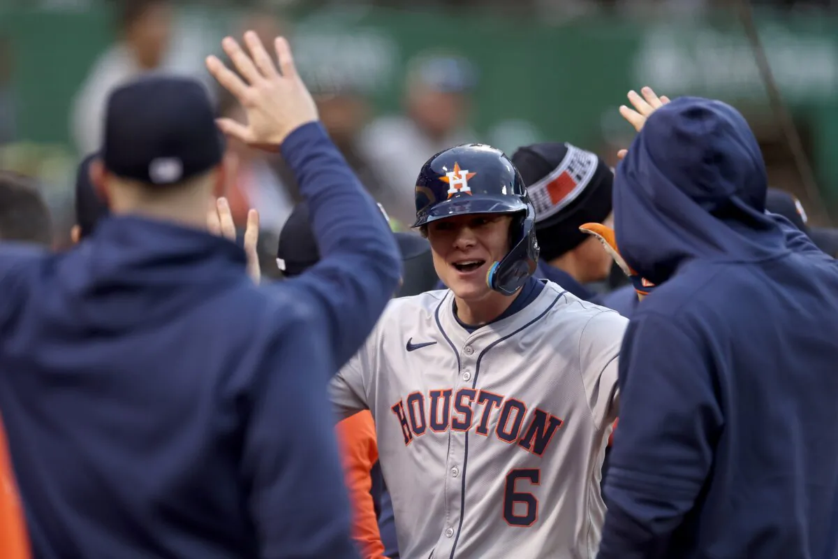 Jake Meyers (6) of the Houston Astros is congratulated by teammates after he hit a three-run home run against the Oakland Athletics in the fourth inning at Oakland Coliseum in Oakland on May24, 2024. (Ezra Shaw/Getty Images)