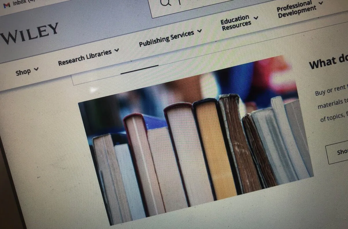 A photo of part of the home page for Wiley, a U.S. multinational publishing company focusing on academic publishing and instructional materials. (The Epoch Times)