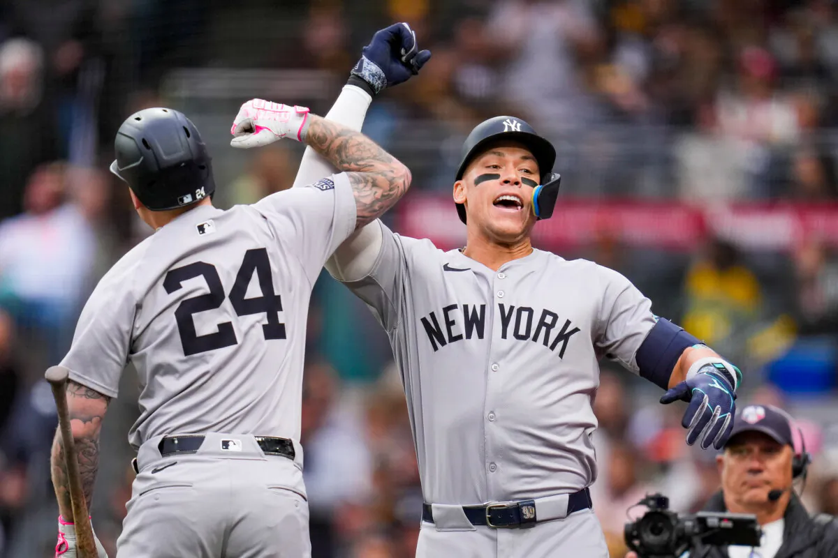 New York Yankees' Aaron Judge (R) celebrates with teammate Alex Verdugo after hitting a two-run home run during the first inning of a baseball game against the San Diego Padres in San Diego on May 25, 2024. (Gregory Bull/AP Photo)