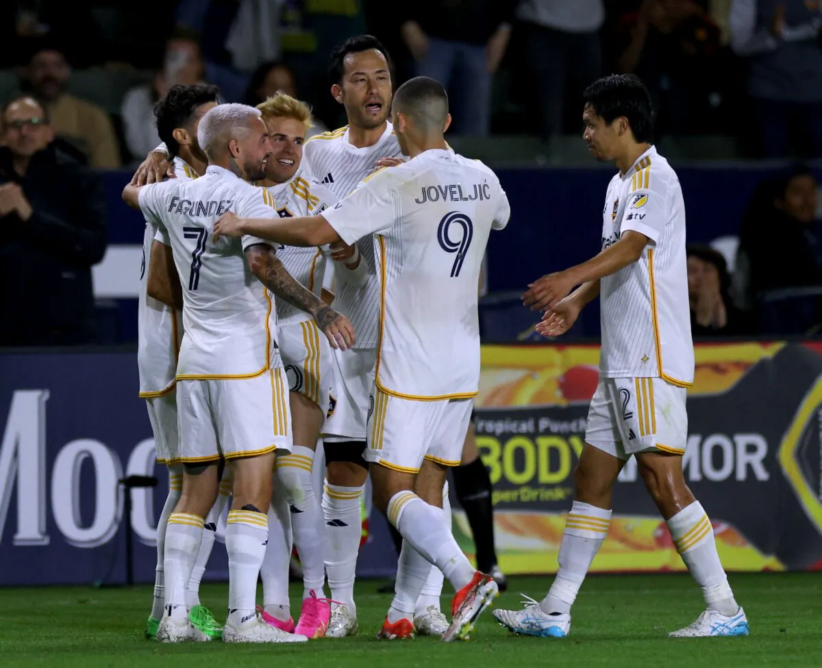 Riqui Puig (10) of Los Angeles Galaxy celebrates his goal with Gastón Brugman (5), Diego Fagúndez (7), Maya Yoshida (4), Dejan Joveljić (9) and Miki Yamane (2) during a 2–1 Galaxy win over the Houston Dynamo in Carson, Calif., on May 25, 2024. (Harry How/Getty Images)