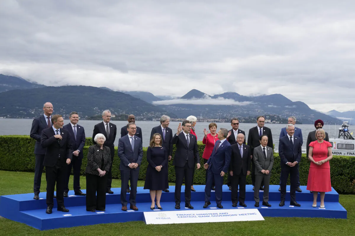 Finance Ministers and Central Bank Governors pose for the family picture at the G7 Finance Ministers meeting in Stresa, northern Italy, on May 24, 2024. (Antonio Calanni/AP Photo)