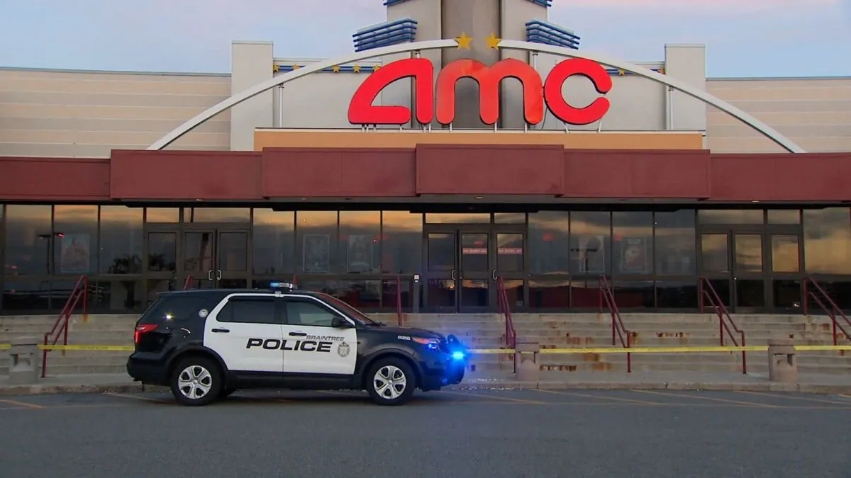 A police car at the scene of a stabbing at an AMC theater in Braintree, Mass., on May 25, 2024. (WBZ via CNN Newsource)