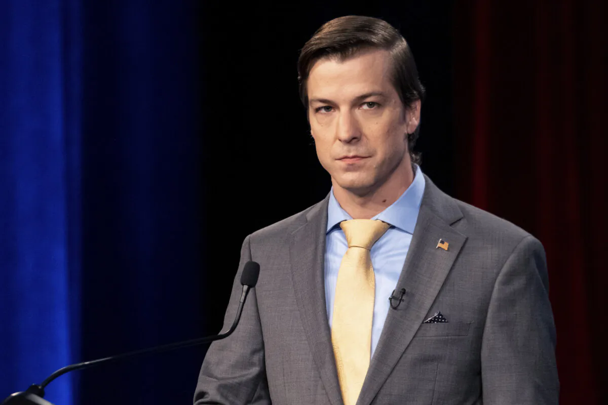 Libertarian Chase Oliver, candidate for Georgia's U.S. Senate seat, listens during a debate in Atlanta on Oct. 16, 2022. (Ben Gray/AP Photo)