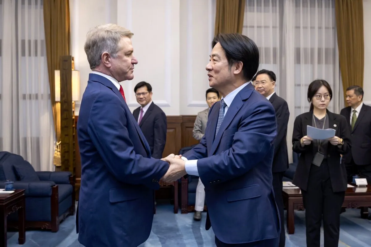Taiwanese President Lai Ching-te (R) shakes hands with Rep. Michael McCaul (R-Texas) during a meeting in Taipei, Taiwan, on May 27, 2024. (Taiwan Presidential Office via AP)