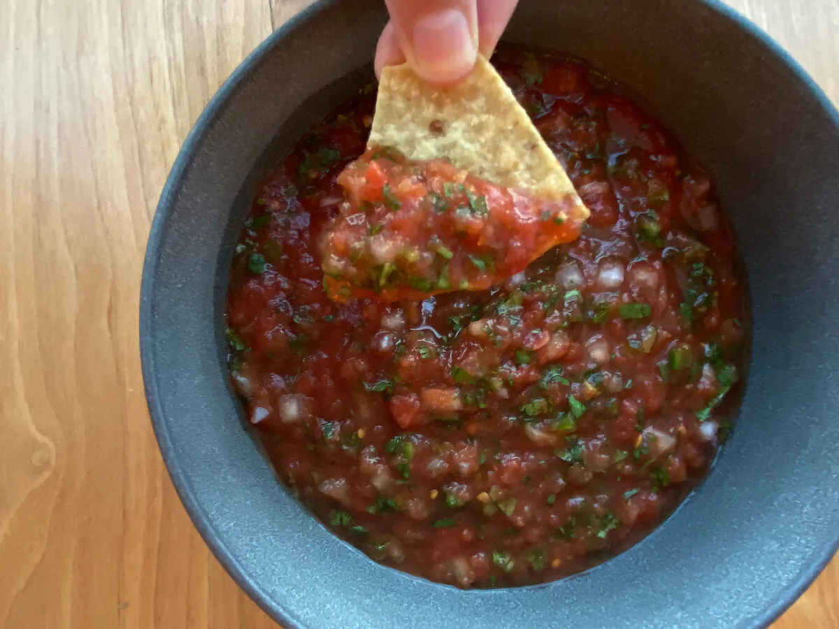 This 4-ingredient salsa comes together in 15 minutes from start to finish and will keep in the fridge for two weeks. (Adriana Veldez/TNS)