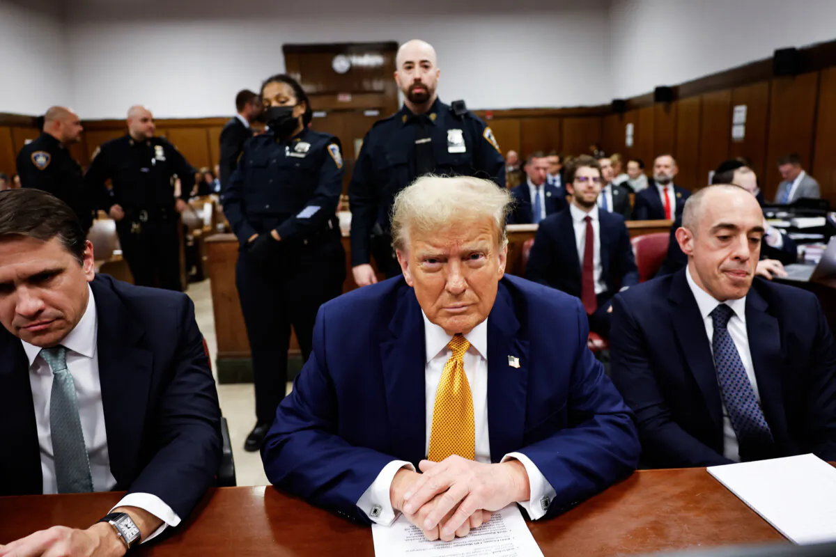 Former President Donald Trump (C) sits in the courtroom with attorneys Todd Blanche (L) and Emil Bove at Manhattan Criminal Court in New York City on May 14, 2024. (Michael M. Santiago/Getty Images)