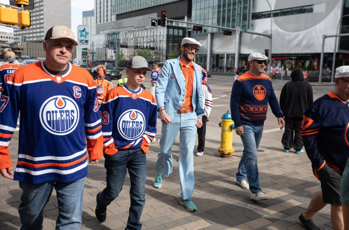 Fans make their way to watch the Edmonton Oilers take on the Dallas Stars during third-round NHL playoff action in Edmonton on May 27, 2024. (The Canadian Press/Jason Franson)