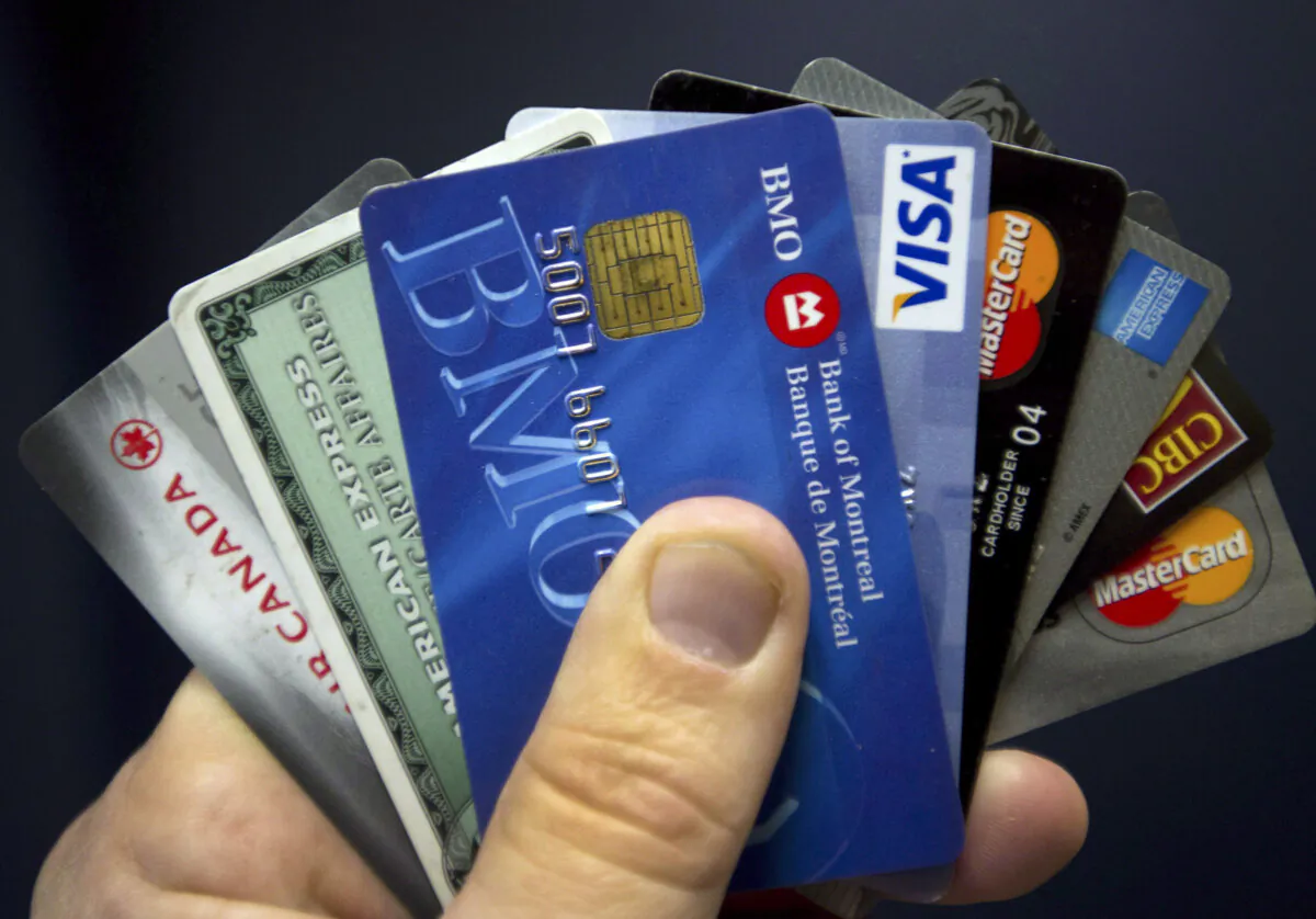 Credit cards are displayed in Montreal, on Dec. 12, 2012. (The Canadian Press/Ryan Remiorz)