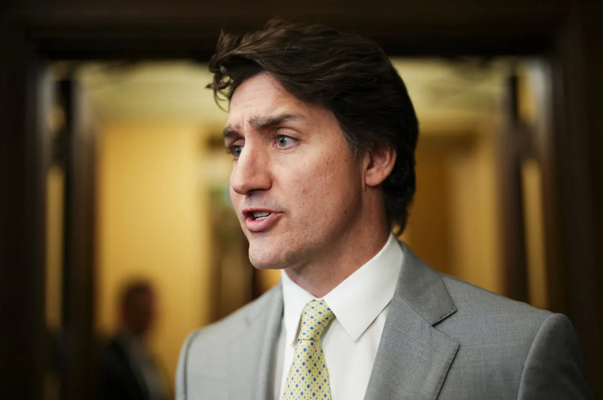 Prime Minister Justin Trudeau speaks to reporters in the foyer of the House of Commons on Parliament Hill in Ottawa on May 28, 2024. (The Canadian Press/Sean Kilpatrick)