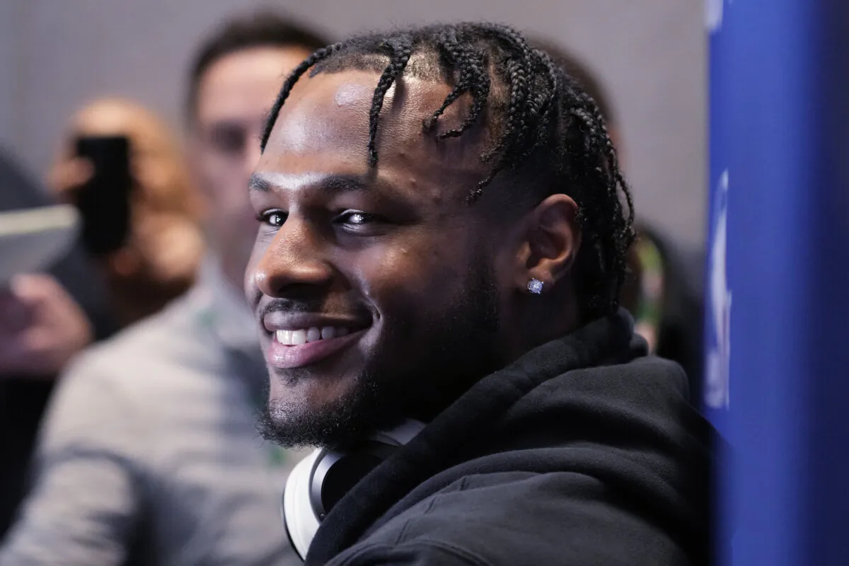 Bronny James smiles as he listens to reporters during the 2024 NBA basketball Draft Combine in Chicago on May 14, 2024. (Nam Y. Huh/AP Photo)