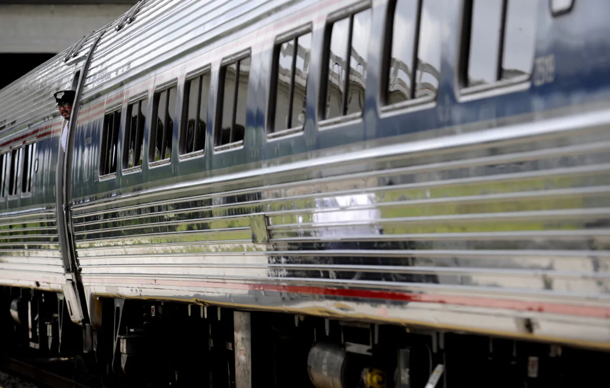 An Amtrak train pulls out of the Fort Lauderdale station. The rail line's Auto Train service carries passengers and their cars from Virginia to Central Florida. (Susan Stocker/South Florida Sun Sentinel/TNS)