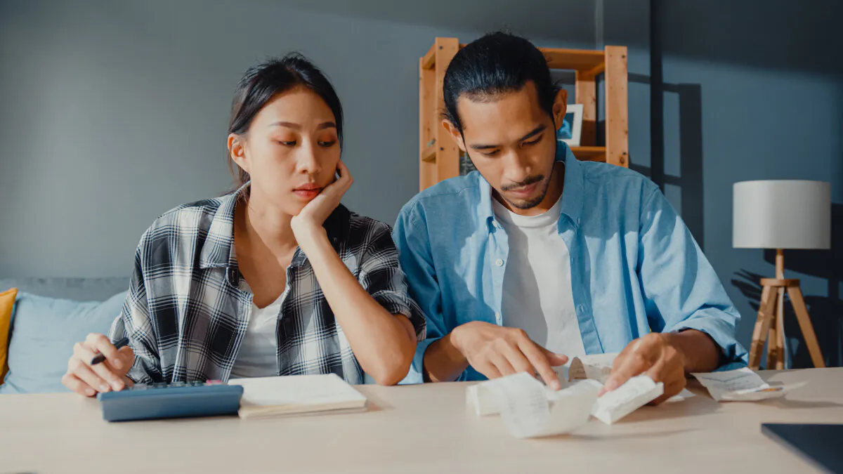Should a married couple spend money they don't have to celebrate an anniversary? (Tirachard Kumtanom/Shutterstock)