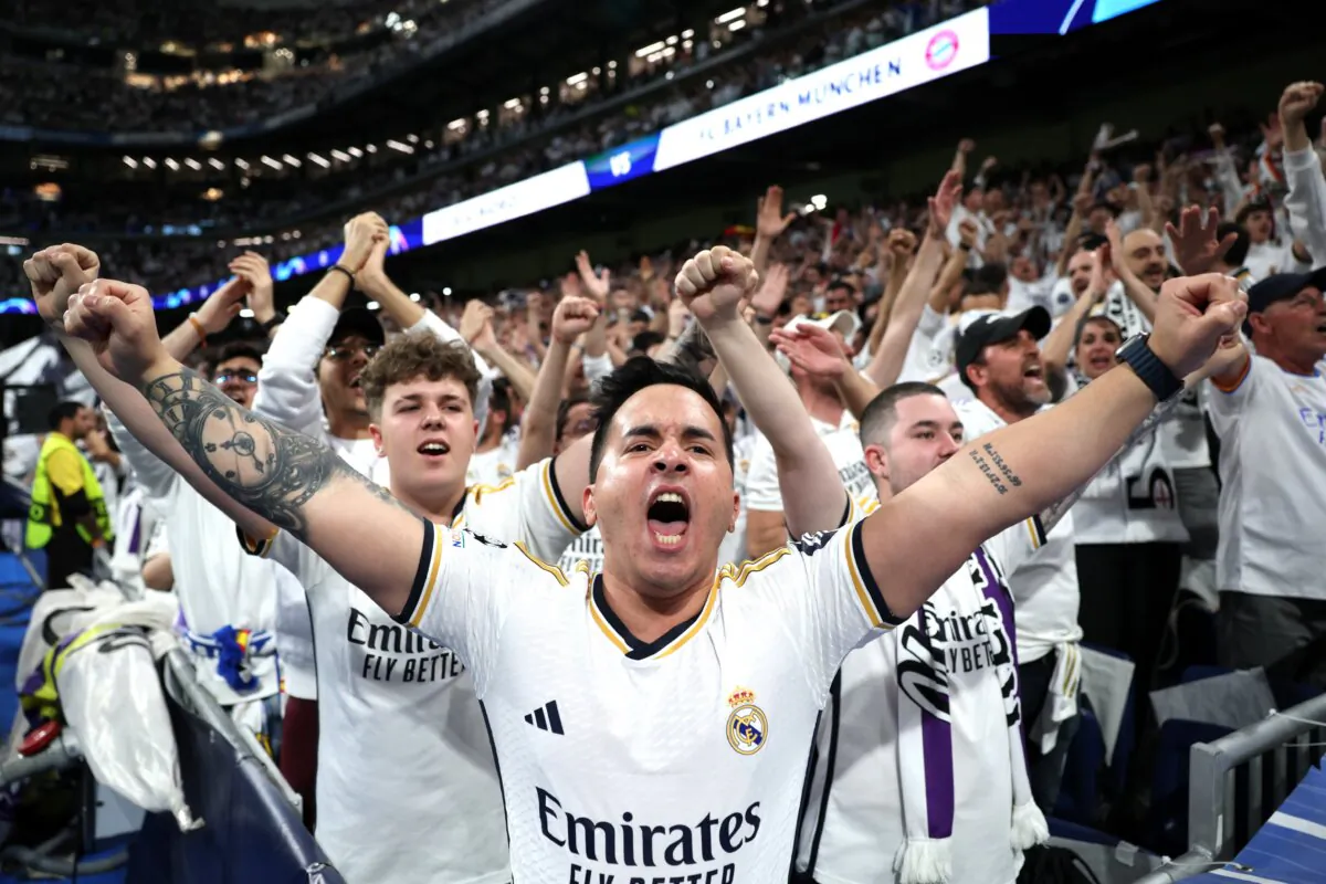 Fans of Real Madrid show their support prior to the UEFA Champions League semi-final second leg match between Real Madrid and FC Bayern München at Estadio Santiago Bernabeu on May 08, 2024 in Madrid, Spain. (Clive Brunskill/Getty Images)
