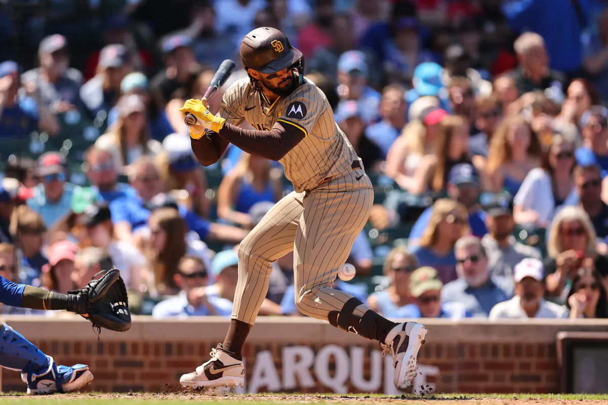 Fernando Tatis Jr. (23) of the San Diego Padres avoids a inside pitch against the Chicago Cubs at Wrigley Field in Chicago on May 8, 2024. (Michael Reaves/Getty Images)