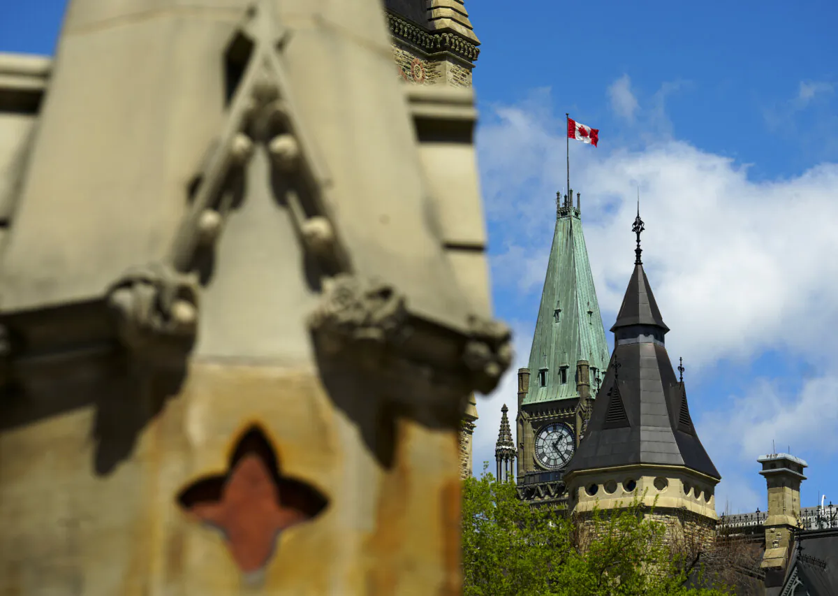 The Peace Tower on Parliament Hill is pictured from the West Gate in Ottawa on May 6, 2024. (The Canadian Press/Sean Kilpatrick)