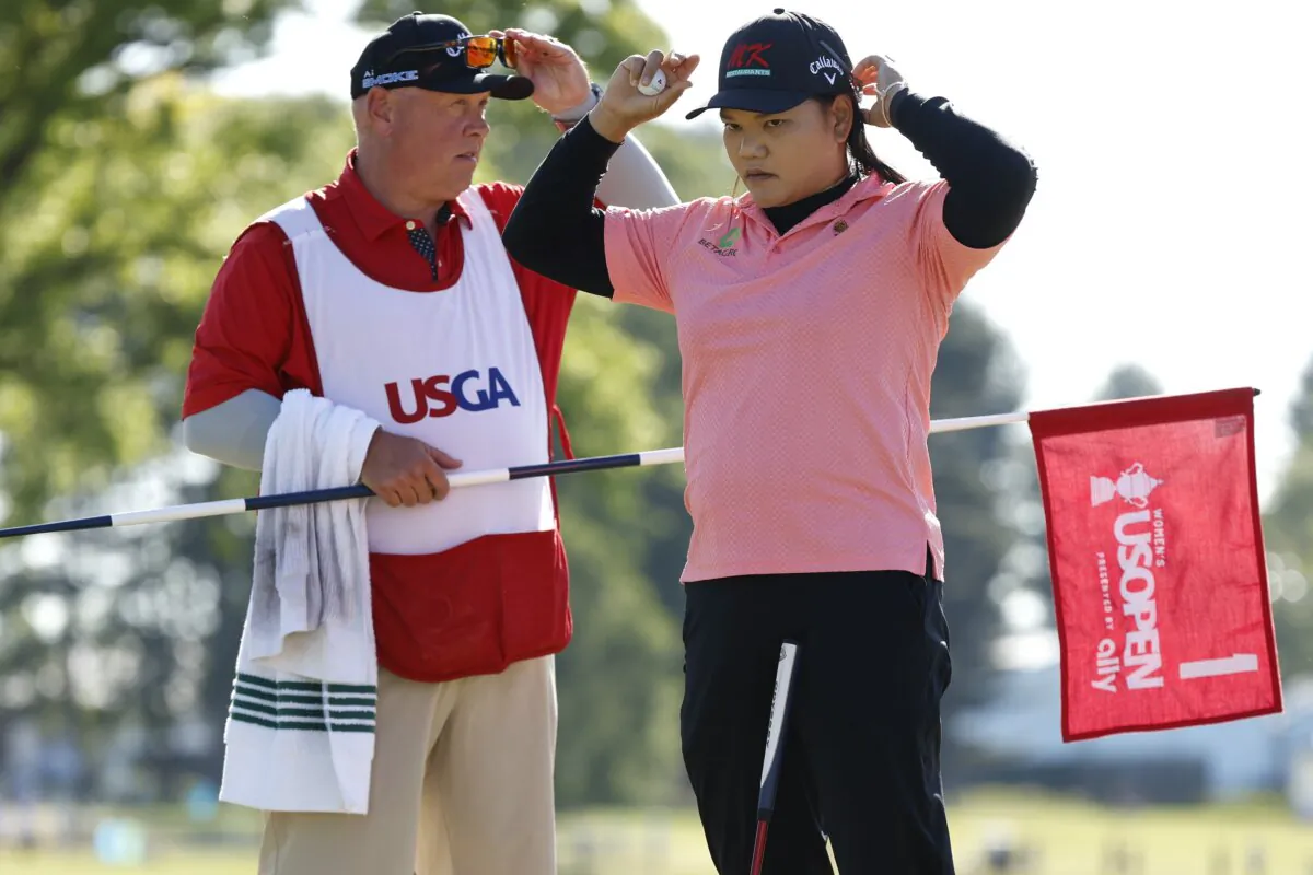 Wichanee Meechai of Thailand and her caddie look on during the second round of the U.S. Women's Open in Lancaster, Penn., on May 31, 2024. (Sarah Stier/Getty Images)