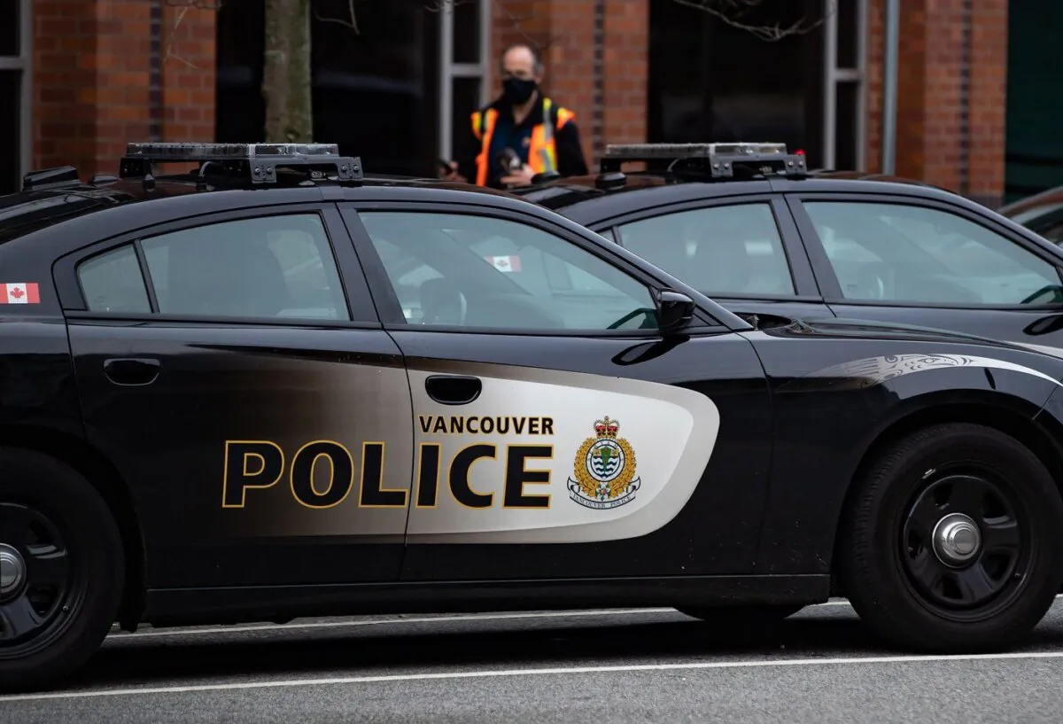 Police cars are seen parked outside Vancouver Police Department headquarters in a file photo. (The Canadian Press/Darryl Dyck)