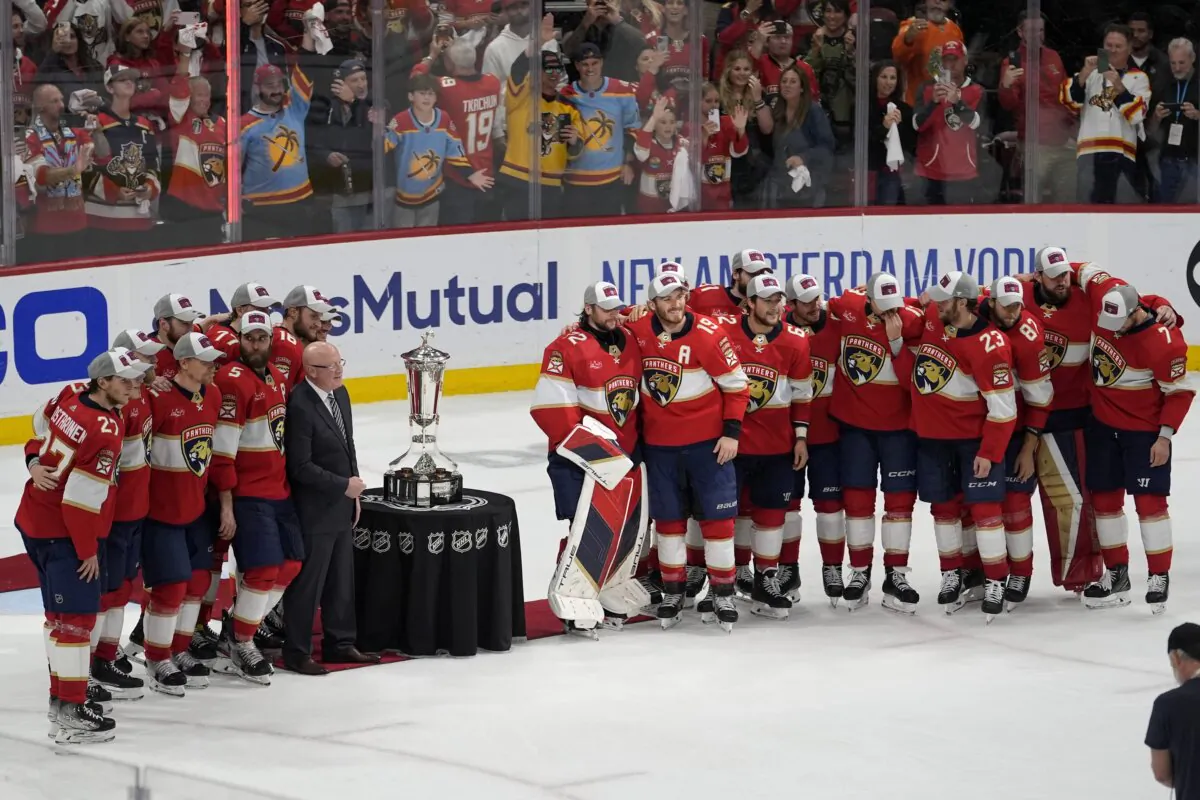 The Florida Panthers pose with the Prince of Wales Trophy after defeating the New York Rangers in Game 6 to win the Eastern Conference finals of the NHL hockey Stanley Cup playoffs in Sunrise, Fla., on June 1, 2024. (Lynne Sladky/AP Photo)