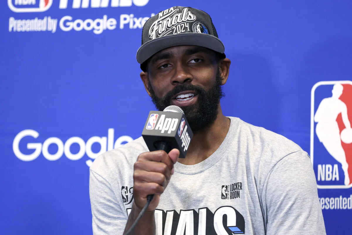 Dallas Mavericks guard Kyrie Irving answers questions during a news conference after the Mavericks defeated the Minnesota Timberwolves in Game 5 of the NBA basketball Western Conference finals in Minneapolis on May 30, 2024. (Matt Krohn/AP Photo)