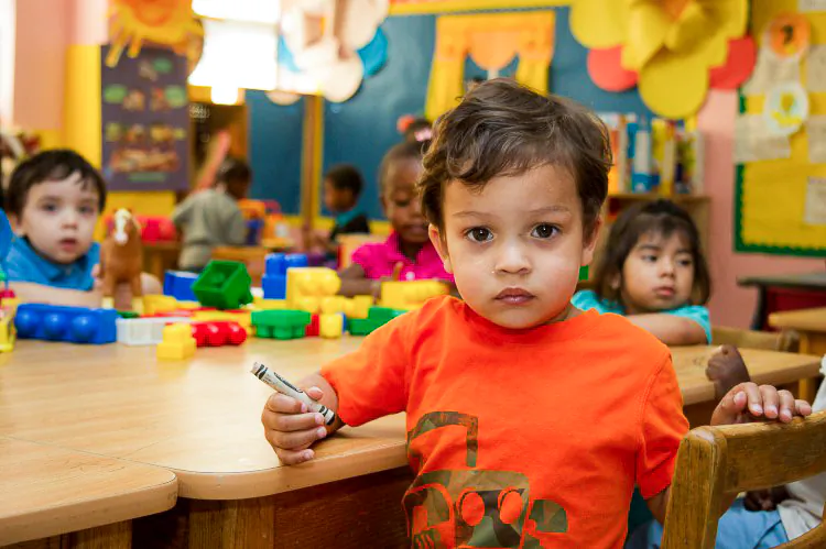 Children sit in a classroom at the Bethel Day Care Center in Brooklyn, New York, on June 14, 2012. (Benjamin Chasteen/The Epoch Times)
