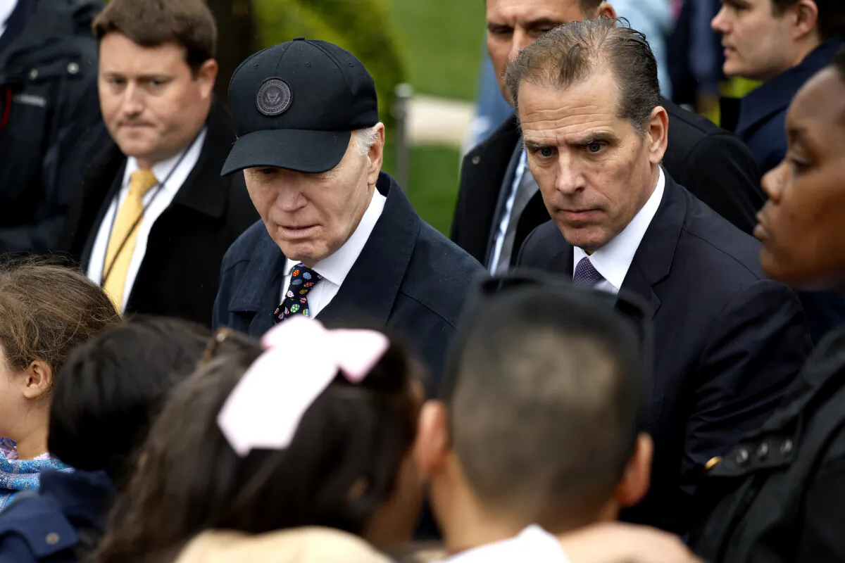 President Joe Biden and his son Hunter Biden talk with guests during the White House Easter Egg Roll on the South Lawn, on April 1, 2024. (Chip Somodevilla/Getty Images)